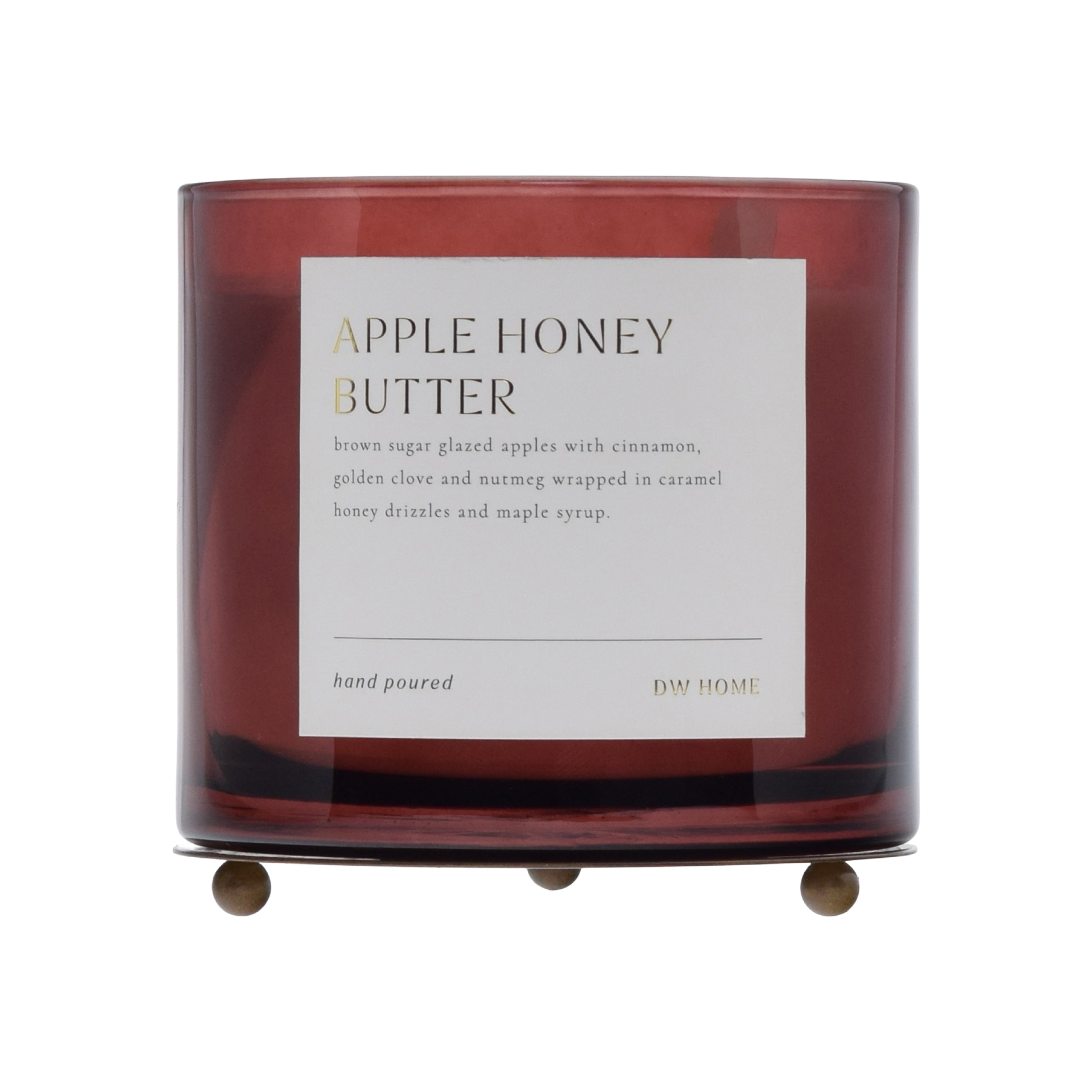 Candle with 'Apple Honey Butter' label on a white background