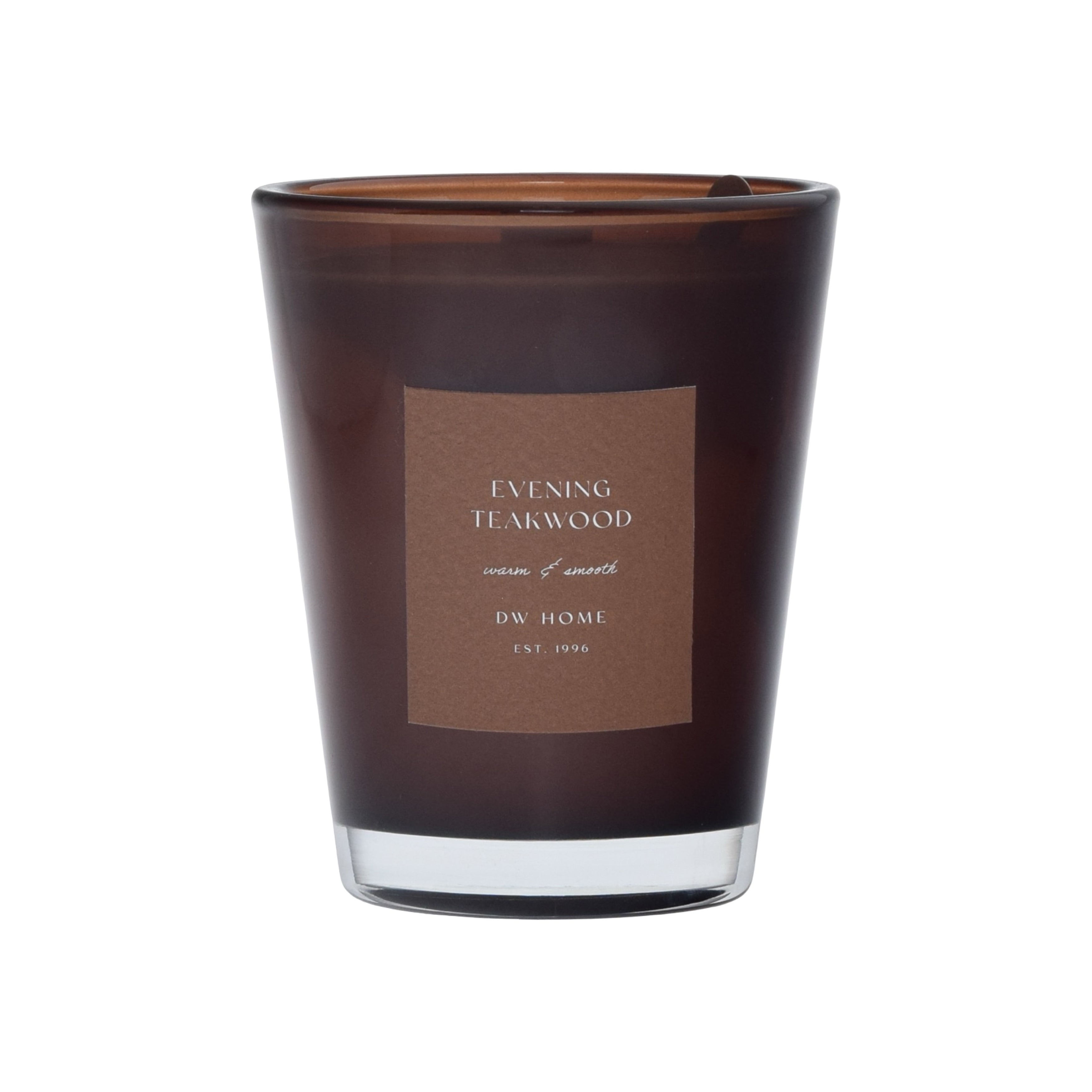 Brown DW Home candle with label on a brown background