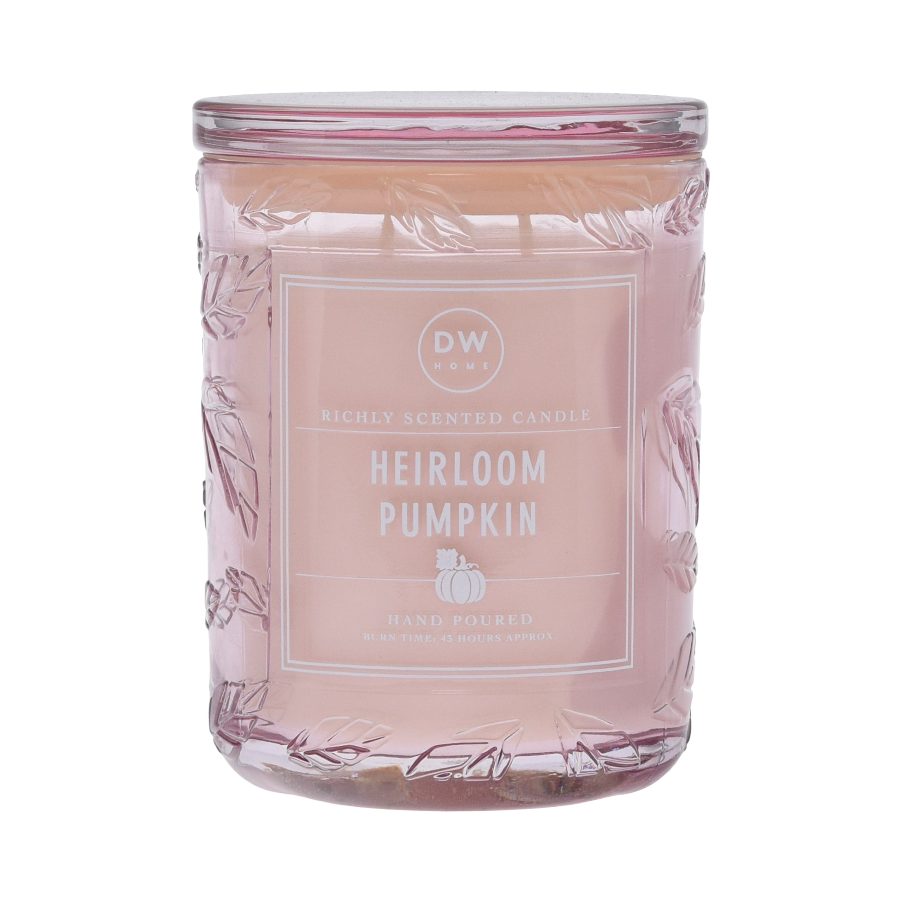 Candle jar labeled 'Heirloom Pumpkin' with a decorative design on a white background