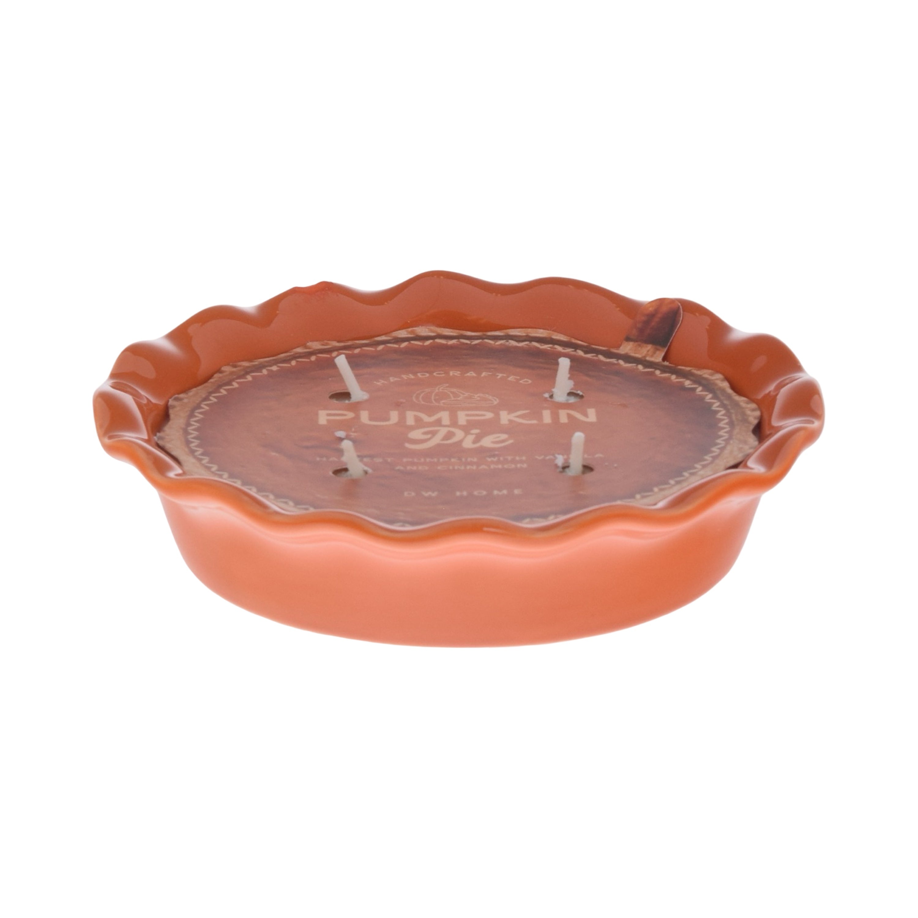 Pumpkin pie-shaped candle with 'Pumpkin Pie' text on a white background