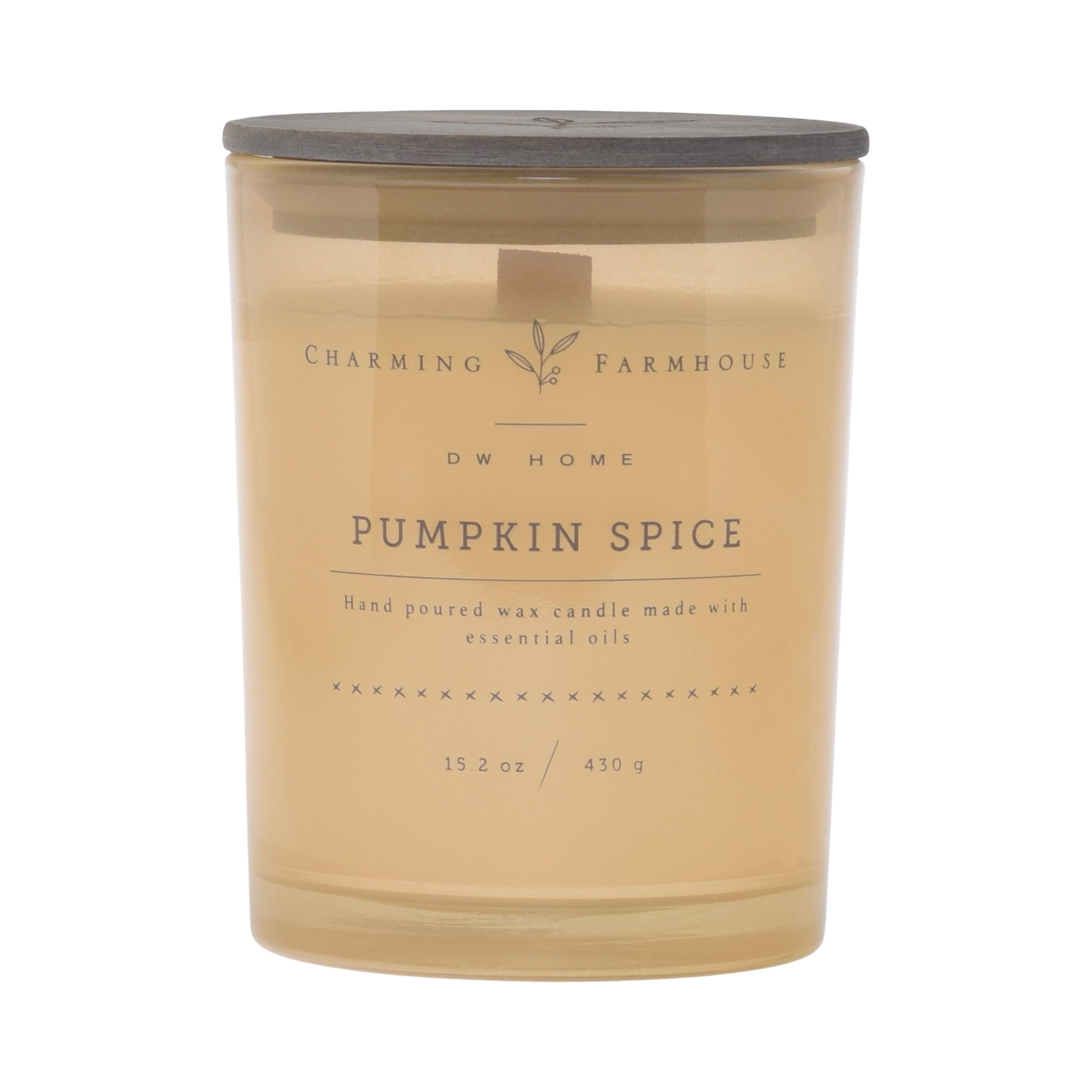 Pumpkin spice candle with 'Charming Farmhouse' branding on a cream background