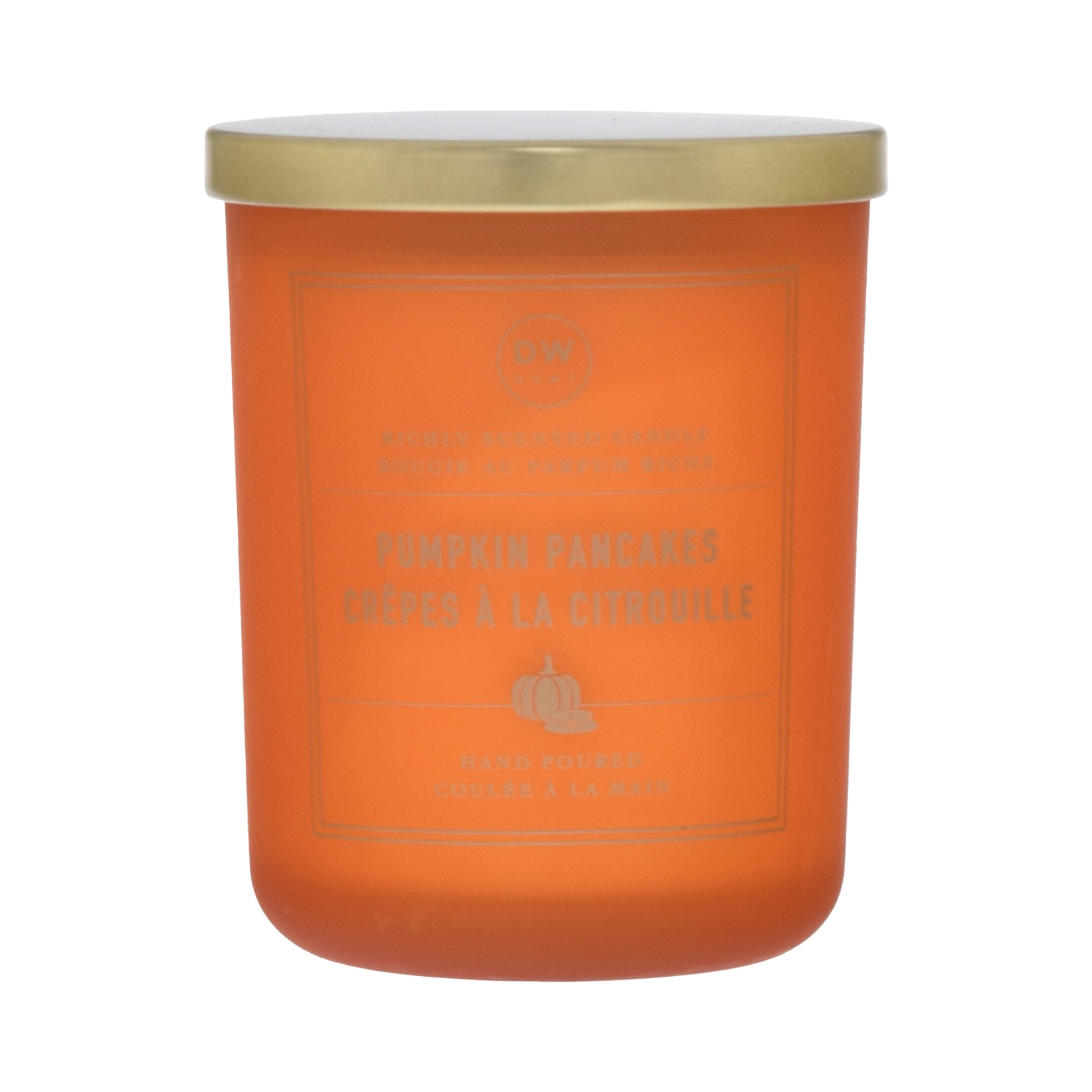 Orange candle with a gold lid on a white background