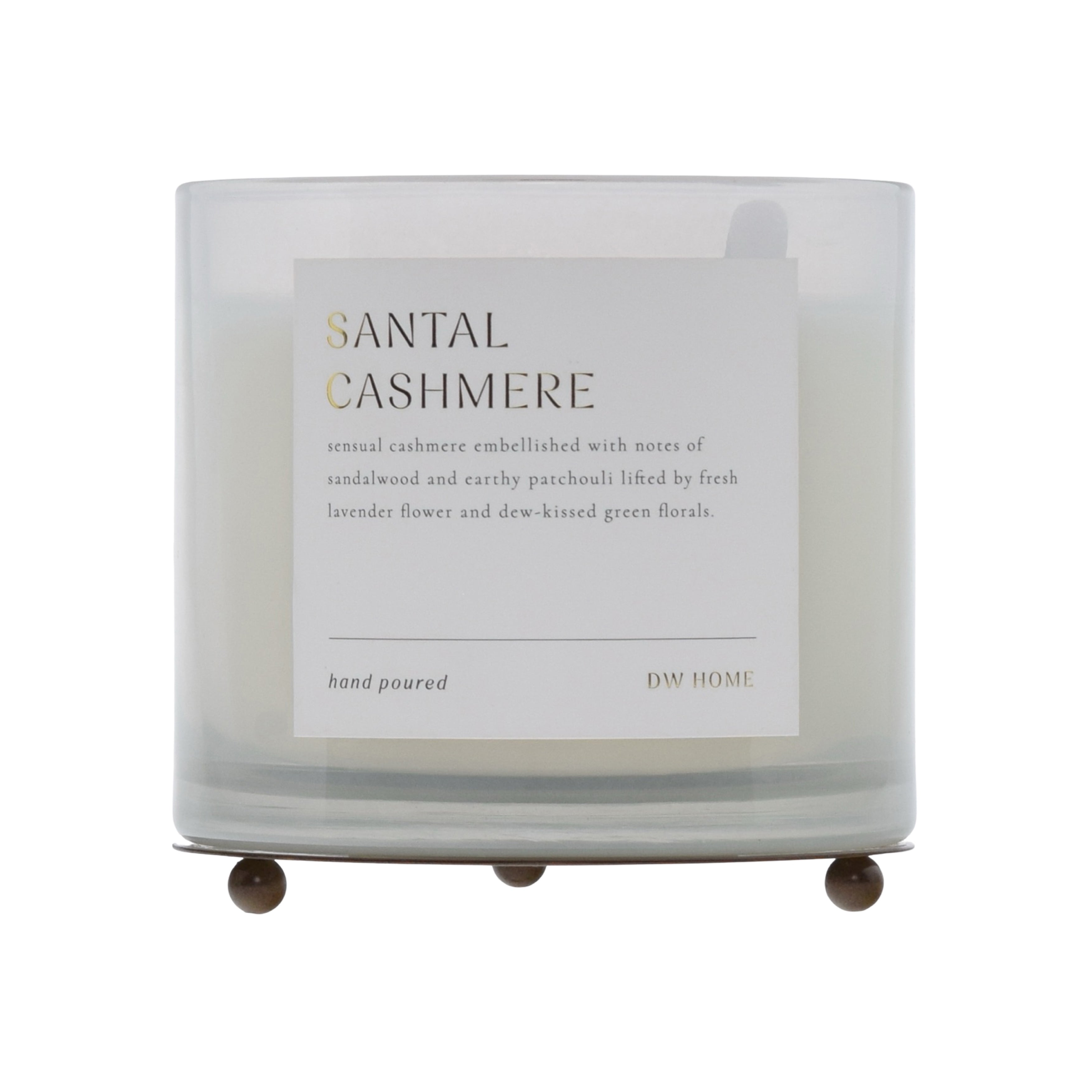 Santal Cashmere candle with a label on a white background