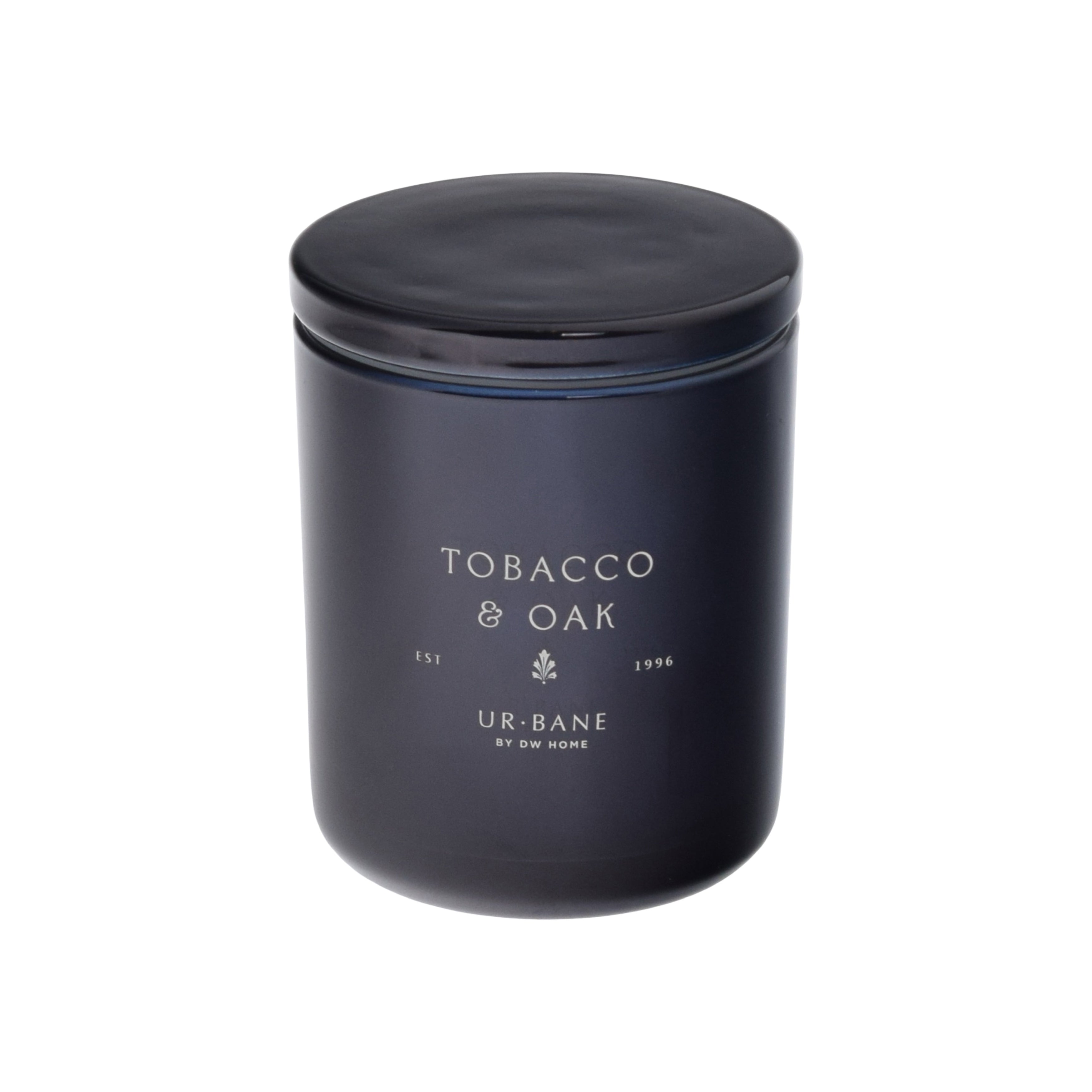 Black candle jar with 'Tobacco & Oak' and brand name on a black background