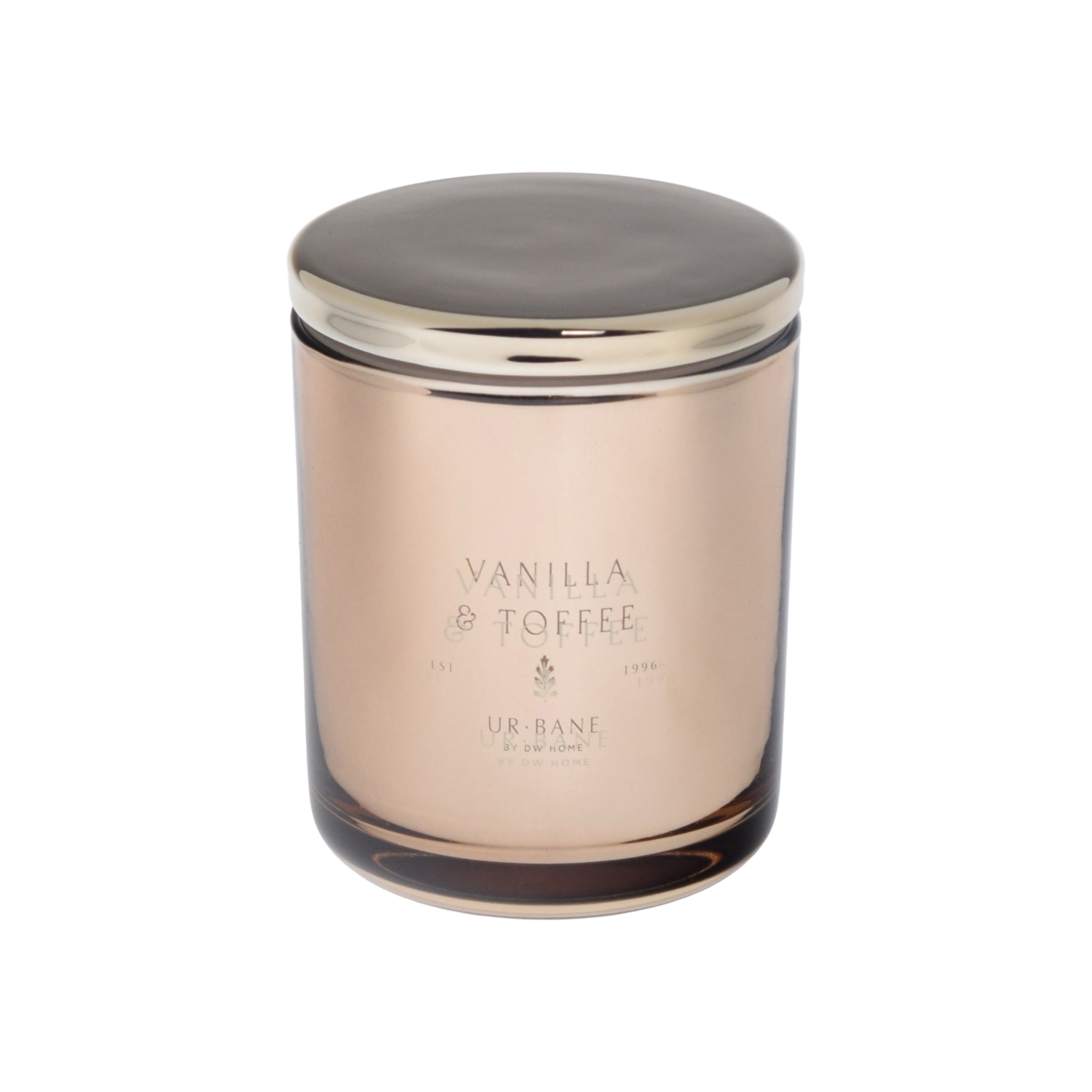 Vanilla and Toffee candle in a glass jar with a metallic lid on a metallic background